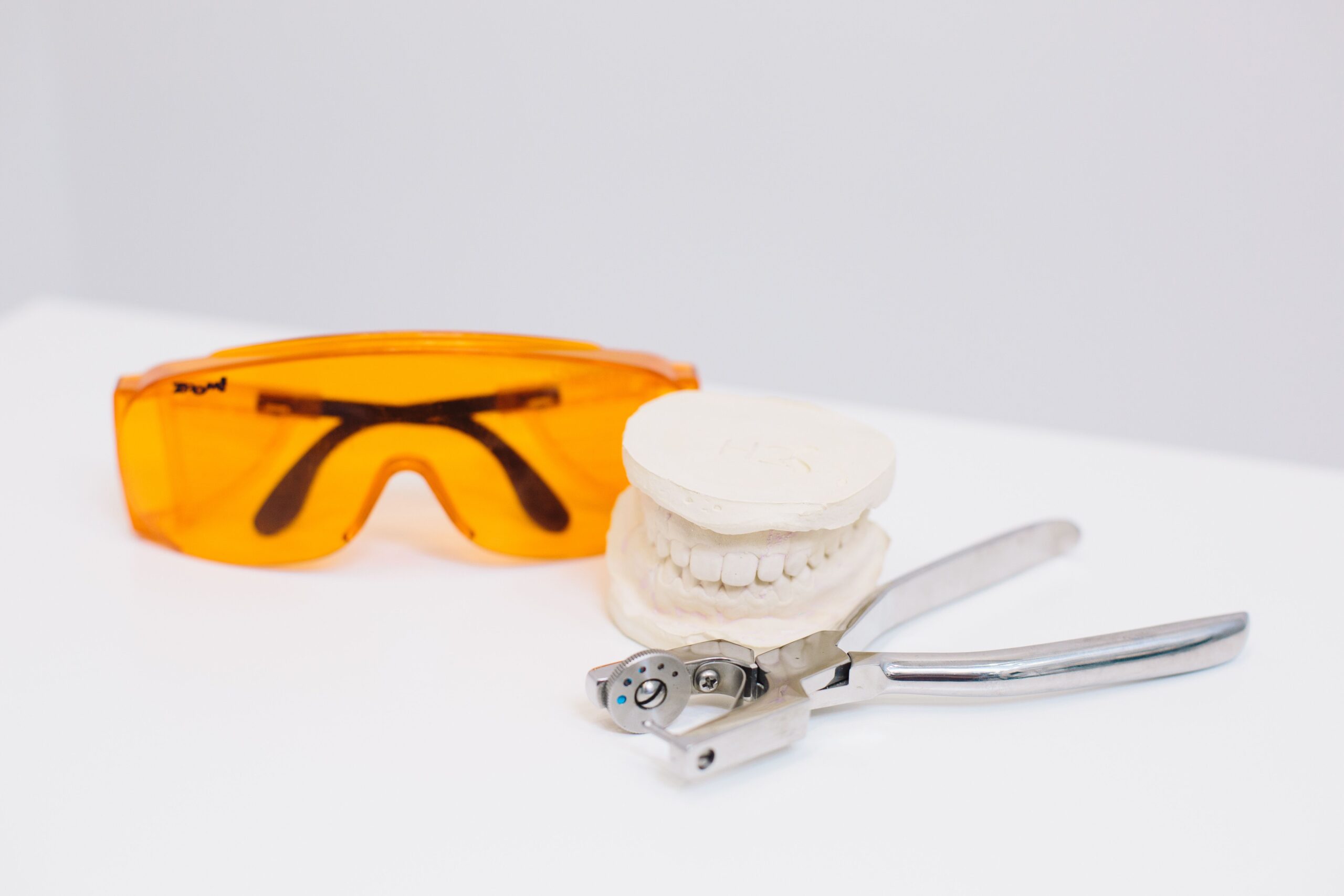 Tooth Extraction in London Ontario 2 Extraction forceps and protective eyewear prepared for a tooth extraction