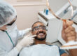 dental clinic checklist - dentist with a smiling patient in London, Ontario