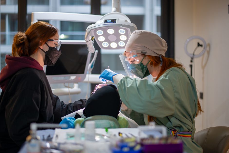 Dental Implants in London Ontario 1 Clinical team placing dental implants during surgery at our London, Ontario clinic
