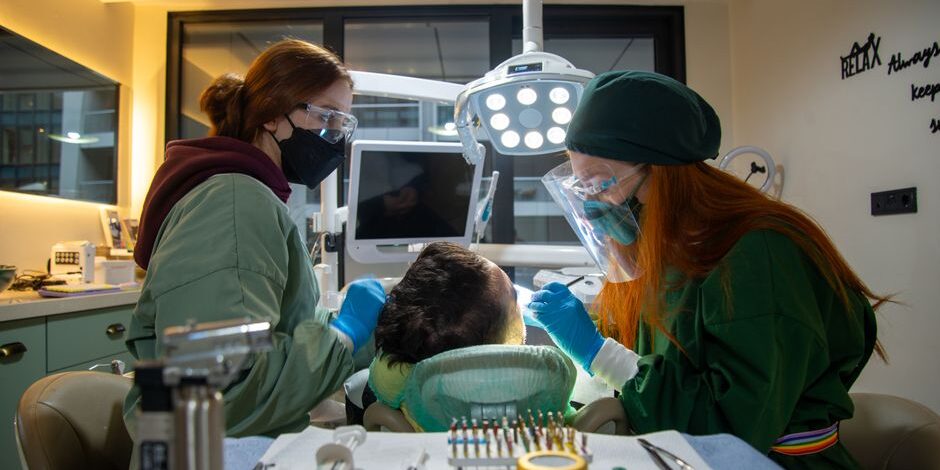 pexels-photo-19976571 Teen wearing Invisalign for teens clear aligners at a dental clinic in London, Ontario
